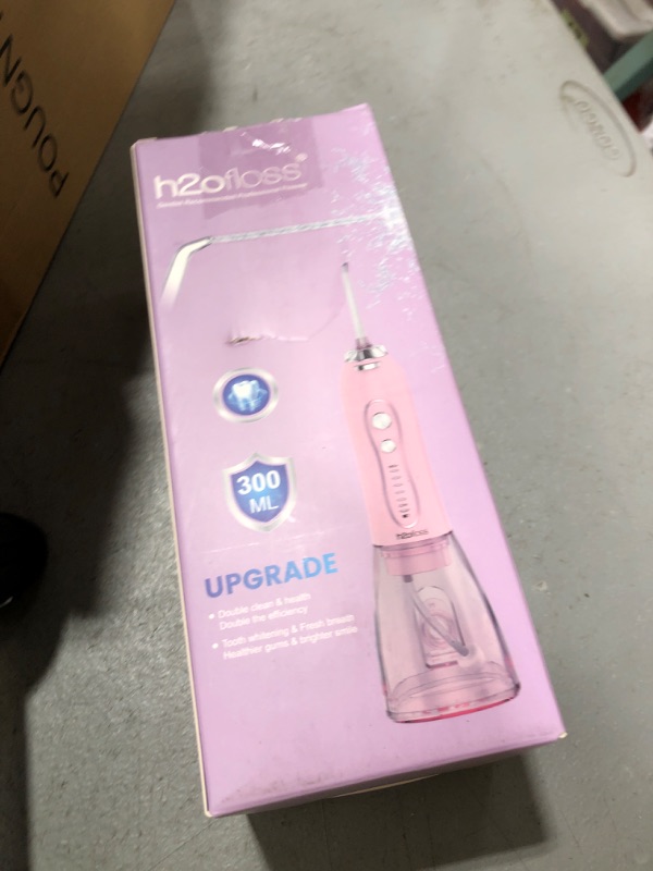 Photo 1 of Water Dental Flosser Teeth Cleaner Pick, H2ofloss Cordless Portable Oral Irrigator,5 Mode IPX7 Waterproof Teeth Picks 300ML Rechargeable WaterFlosser for Home Travel (Pink)