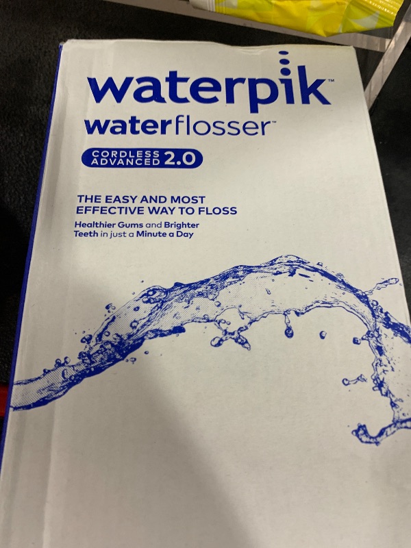 Photo 1 of Waterpik Cordless Advanced 2.0 Water Flosser For Teeth, Gums, Braces, Dental Care With Travel Bag and 4 Tips, ADA Accepted, Rechargeable, Portable, and Waterproof, White WP-580, Packaging May Vary