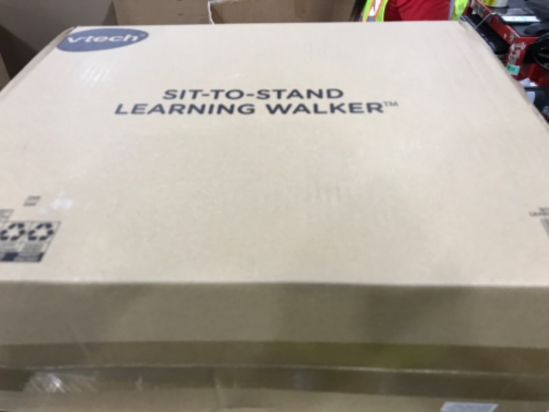 Photo 1 of VTech Sit-to-Stand Learning Walker (Frustration Free Packaging), Pink
