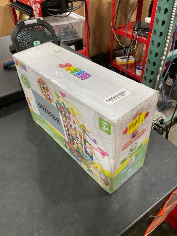 Photo 1 of JOYIN 236Pcs Glowing Marble Run with Motorized Elevator- Construction Building Blocks Toys with 30 Glow in The Dark Plastic Marbles, STEM Toy for Boys and Girls Gift for Christmas
