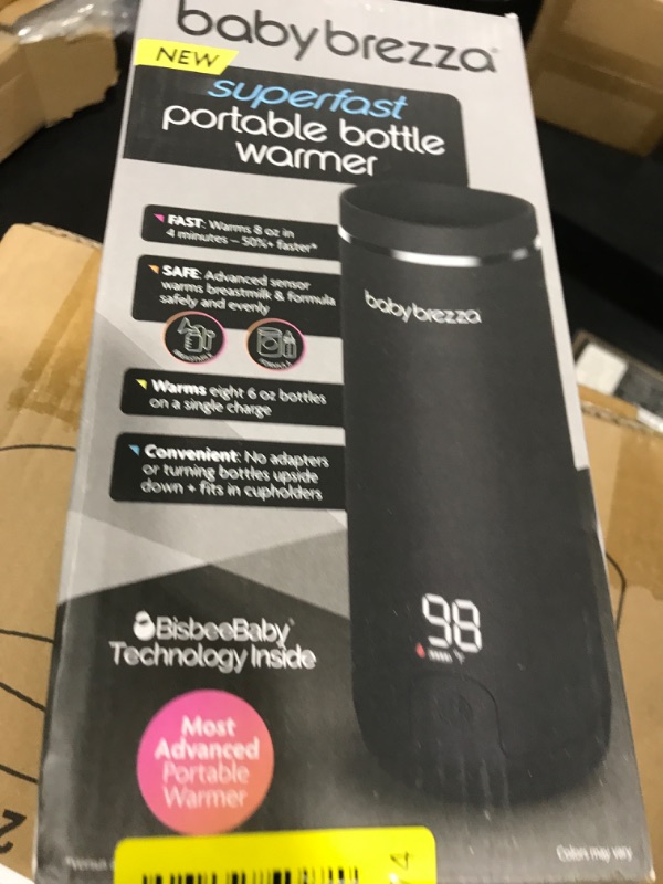 Photo 1 of Baby Brezza SuperFast Portable Baby Bottle Warmer – 67% Faster - Travel Breastmilk Warmer and Formula Warmer - Safe, Even Heating - Up to 9oz - No Adapters, Black