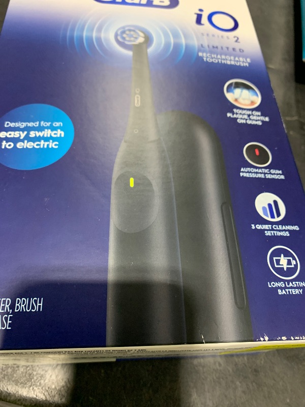 Photo 1 of Oral-B iO Simple Clean Rechargeable Electric Powered Toothbrush, Night Black with 1 Gentle Care Brush Head and 1 Black Travel Case - Automatic Pressure Sensor to Protect Gums - 3 Modes - 2 Min Timer