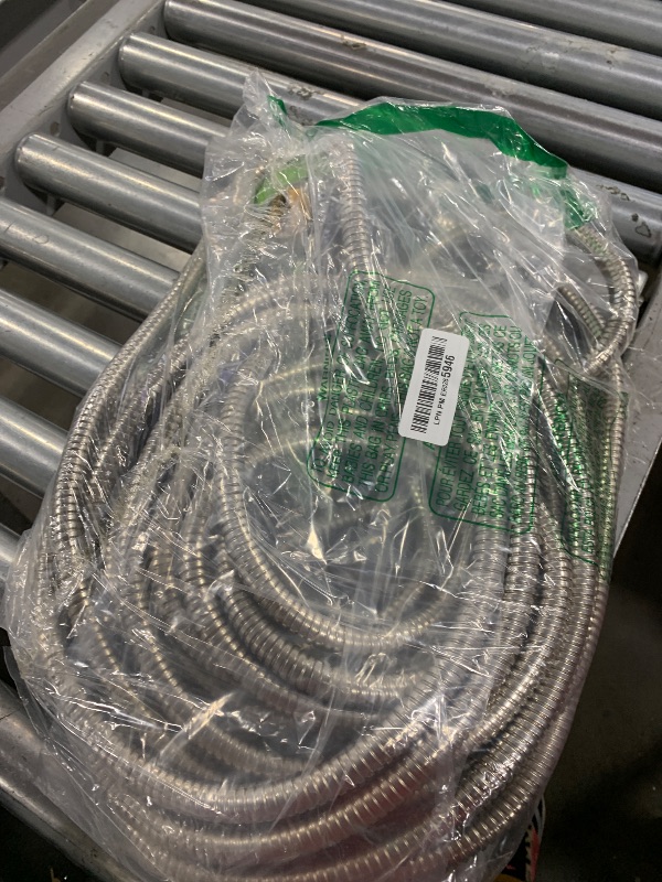 Photo 1 of Garden Hose 50 ft, Stainless Steel Water Hose with 10 Function Nozzle Flexible, Heavy Duty, Lightweight, No-Kink, Pet Proof, Puncture Proof Hose Metal for Yard, Outdoor
