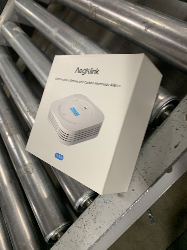 Photo 1 of Aegislink  and Carbon Monoxide Detector 10-Year Lifespan with Replaceable Battery, Photoelectric Fire Alarm and Electrochemical CO Alarm with Test/Silence Button, SC200, 1-Pack