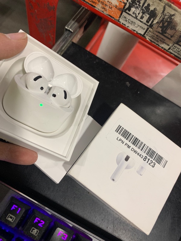 Photo 1 of Apple AirPods 4 Wireless Earbuds, Bluetooth Headphones, with Active Noise Cancellation, Adaptive Audio, Transparency Mode, Personalized Spatial Audio, USB-C Charging Case, Wireless Charging, H2 Chip