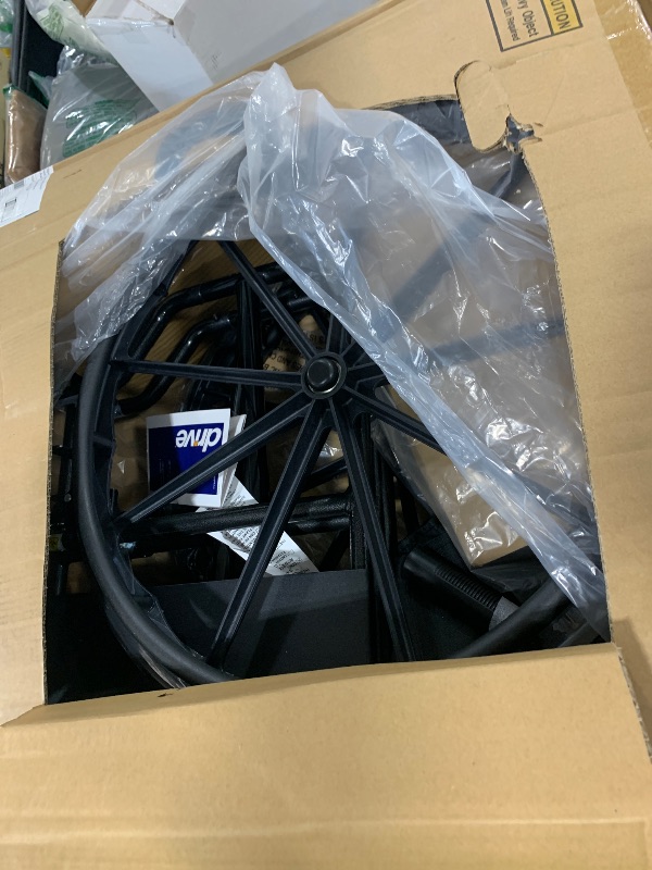 Photo 1 of Drive Medical SSP118FA-SF Silver Sport 1 Folding Transport Wheelchair with Full Arms and Removable Swing-Away Footrest, Black
