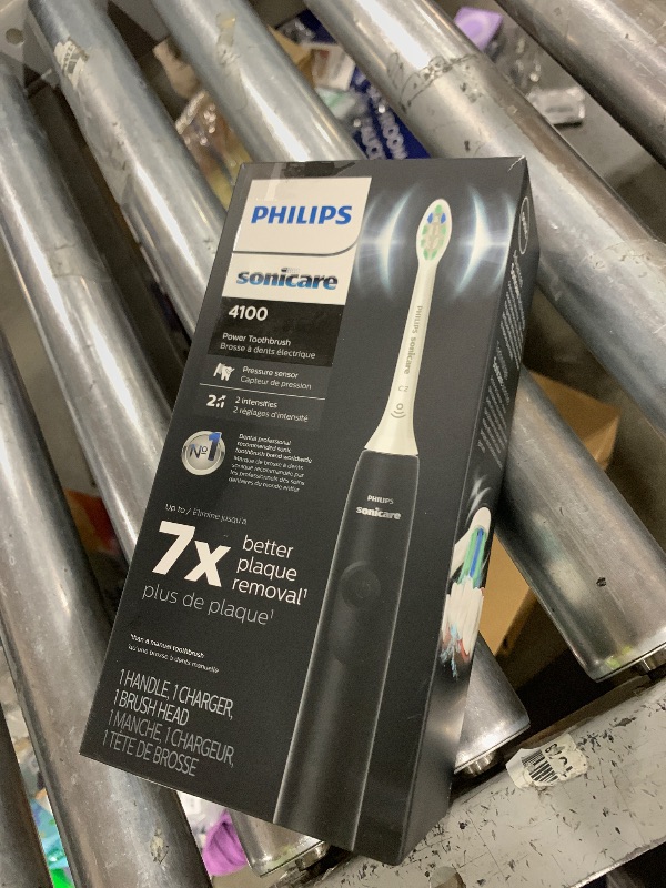 Photo 1 of Philips Sonicare 4100 Rechargeable Electric Toothbrush, with Pressure Sensor, 2 Intensity Settings, SmarTimer and QuadPacer, 14-Day Battery Life, Black, Model HX3681/24