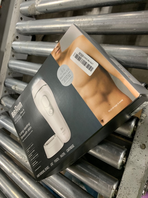 Photo 1 of Braun Smart IPL, Silk·Expert Pro 5: at Home Laser Hair Removal Device for Men & Women, Permanent Visible Hair Reduction in Hair Regrowth for Body, w/Razor, Pouch, and Wide Cap Head, IPL5145