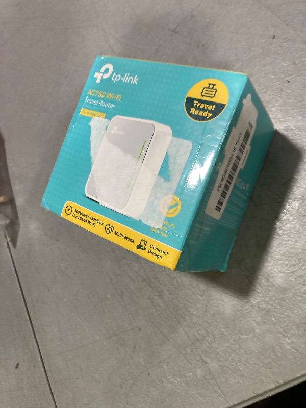 Photo 1 of TP-Link AC750 Wireless Portable Nano Travel Router(TL-WR902AC) - Support Multiple Modes, WiFi Router/Hotspot/Bridge/Range Extender/Access Point/Client Modes, Dual Band WiFi, 1 USB 2.0 Port