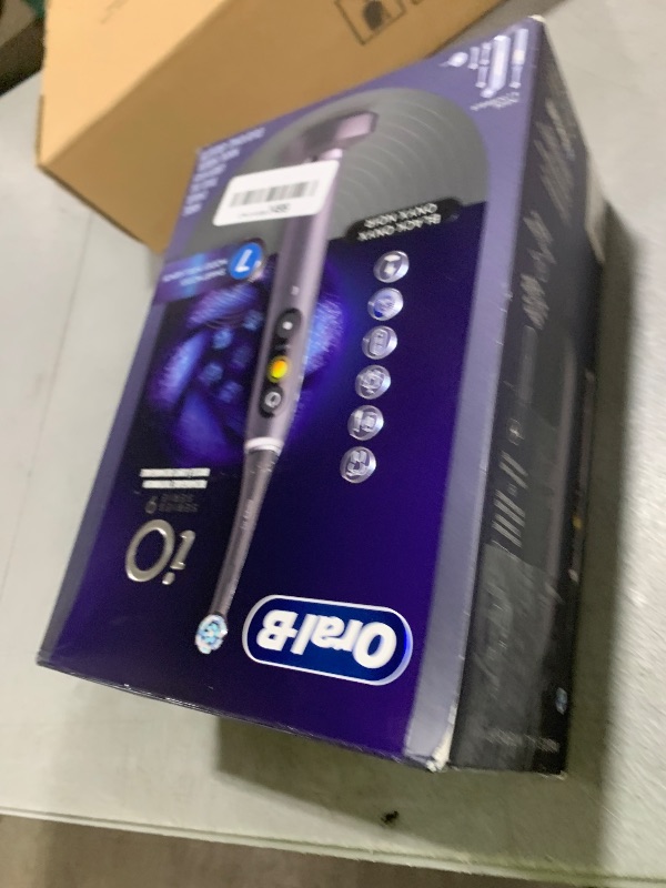 Photo 1 of Oral-B iO Series 9 Electric Toothbrush with 3 Replacement Brush Heads, Black Onyx