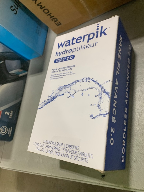 Photo 1 of Waterpik Cordless Advanced 2.0 Water Flosser For Teeth, Gums, Braces, Dental Care With Travel Bag and 4 Tips, ADA Accepted, Rechargeable, Portable, and Waterproof, Blue WP-583, Packaging May Vary