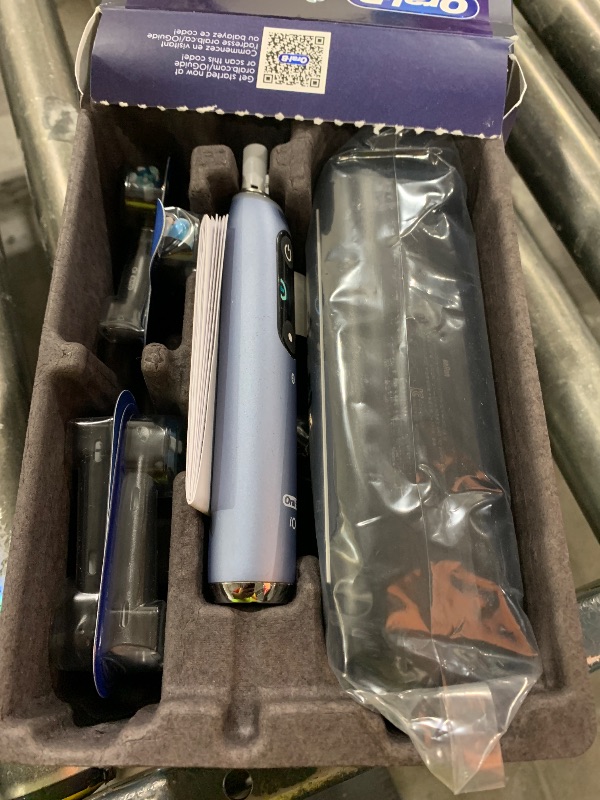 Photo 1 of Oral-B iO Series 9 Electric Toothbrush with 4 Brush Heads, Aqua Alabaster
