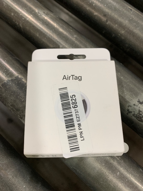 Photo 1 of Apple AirTag. Keep Track of and find Your Keys, Wallet, Luggage, Backpack, and More. Simple one-tap Set up with iPhone or iPad