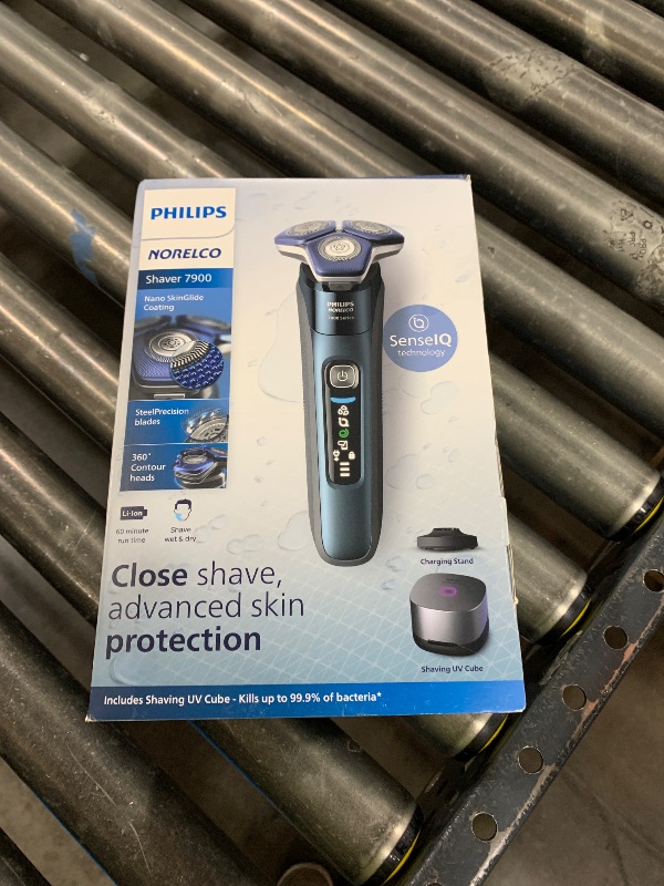 Photo 1 of Philips Norelco Shaver Series 7000, Wet & Dry Electric Shaver with SenseIQ Technology, Pop-up Trimmer, Charging Stand, Travel Case, UV Sanitizing Cube, Model S7889/91