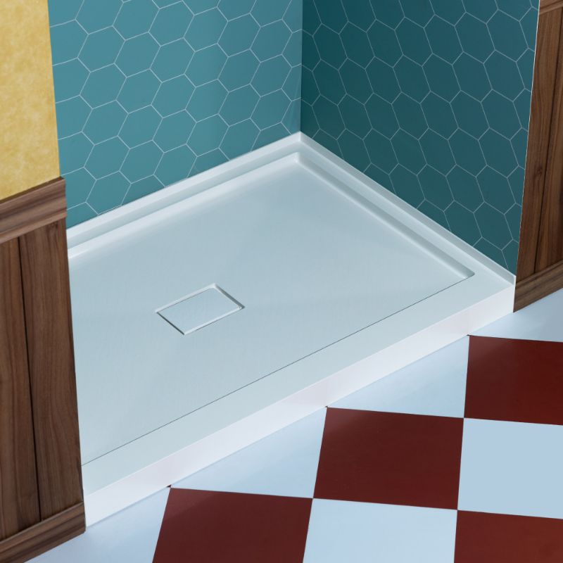Photo 1 of WOODBRIDGE 48 in. x 32 in. Solid Surface Shower Pan Base in White, Alcove Installation with Center Drain, Slip-Resistant & Mold-Resistant
