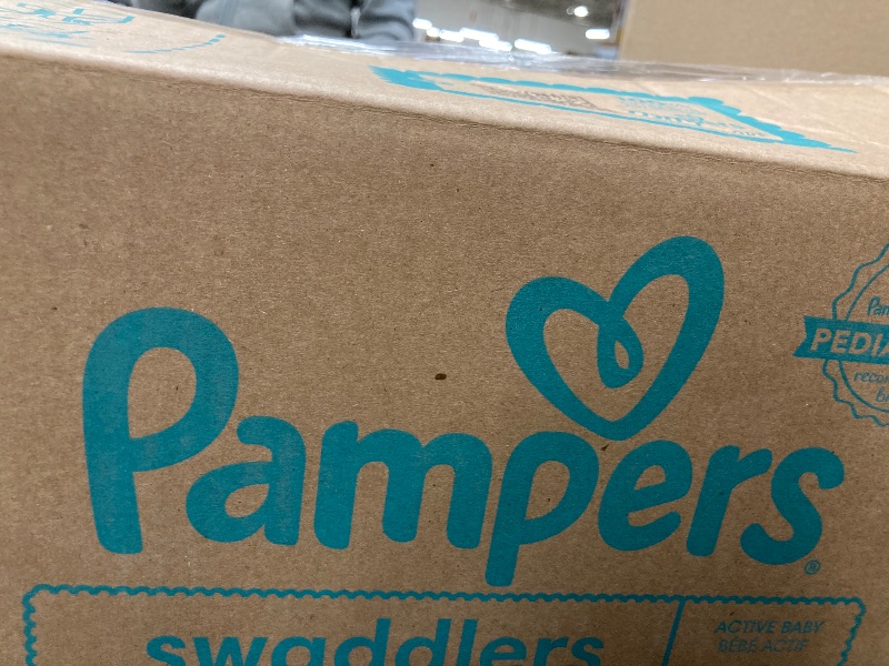 Photo 1 of *********MISING PARTS**** pampers 14 150 diapers