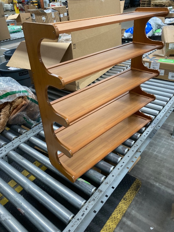 Photo 1 of **HAS SMALL CRACK ON SIDE**5 shelf wood rack