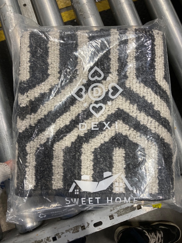 Photo 1 of `door mat