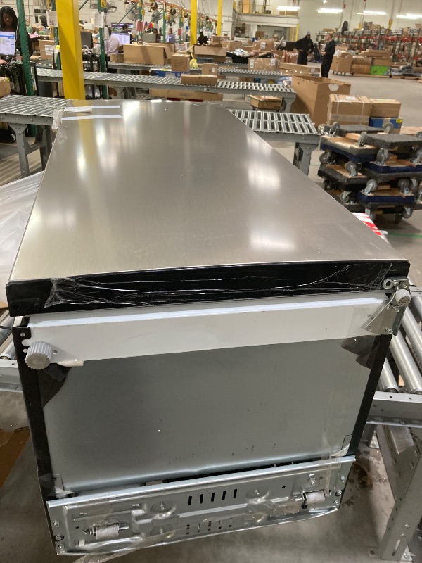 Photo 1 of ***and it doesn't sound very good It is used, it is missing a piece, it has some dents on the bottom of the refrigerator and it is not known if it works 100%.**KoolMore KM-RUF-7S-SS 7 Cu. Ft. Garage Ready Convertible Upright Manual Defrost Freezer/Refrig