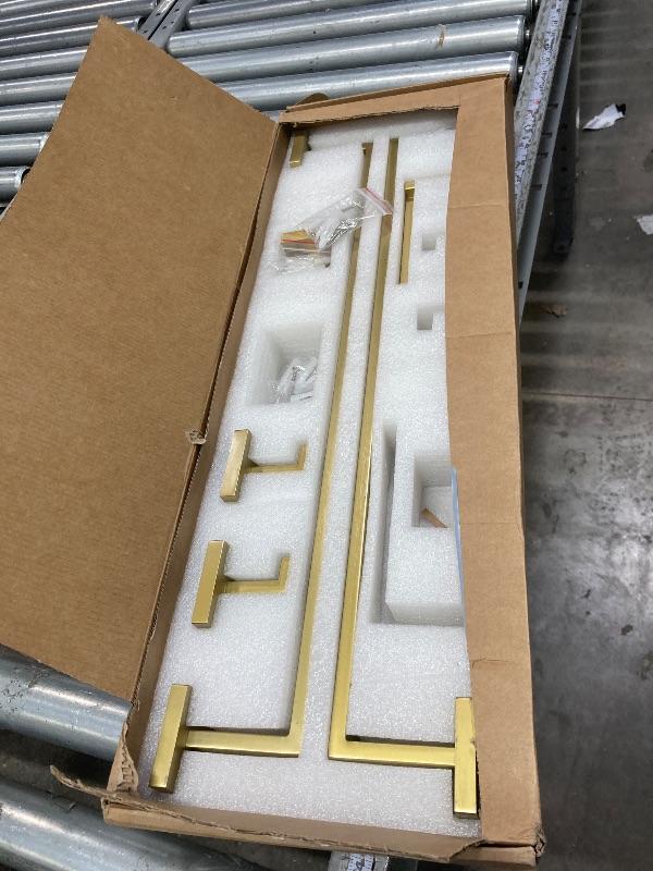 Photo 1 of **It is used, it is missing a part and it is not known if it works 100%.***23.6Inch Brushed Gold Towel Bar Set, 10 Pieces Bathroom Accessories Set, SUS304 Stainless Steel Towel Racks Toilet Paper Holder Set for Bathroom Wall Mounted