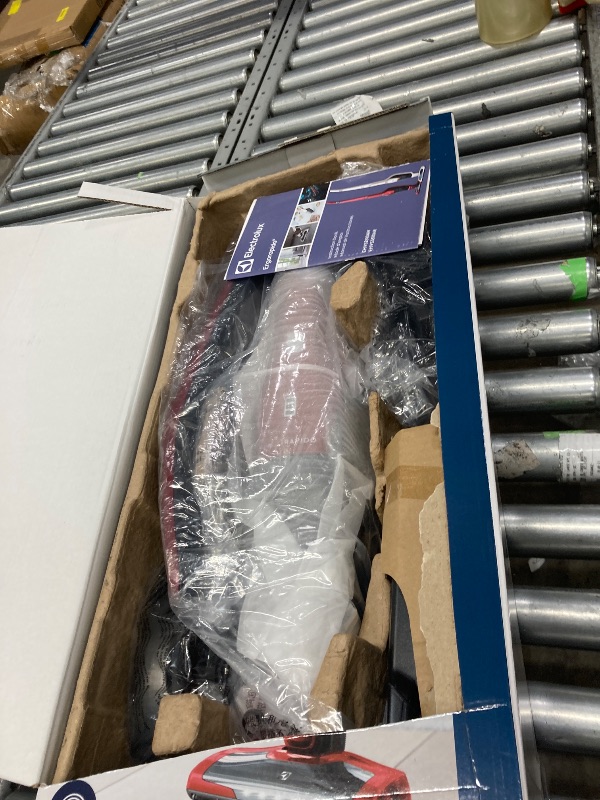 Photo 1 of **It is used, it is missing a piece and it is not known if it is 100% functional.***Electrolux Ergorapido Pet Cordless 2-in-1 Vacuum Cleaner with Motorized Pet Nozzle for Easy Pet Hair Removal, 48-Minute Run Time, 2 Power Modes, Chili Red