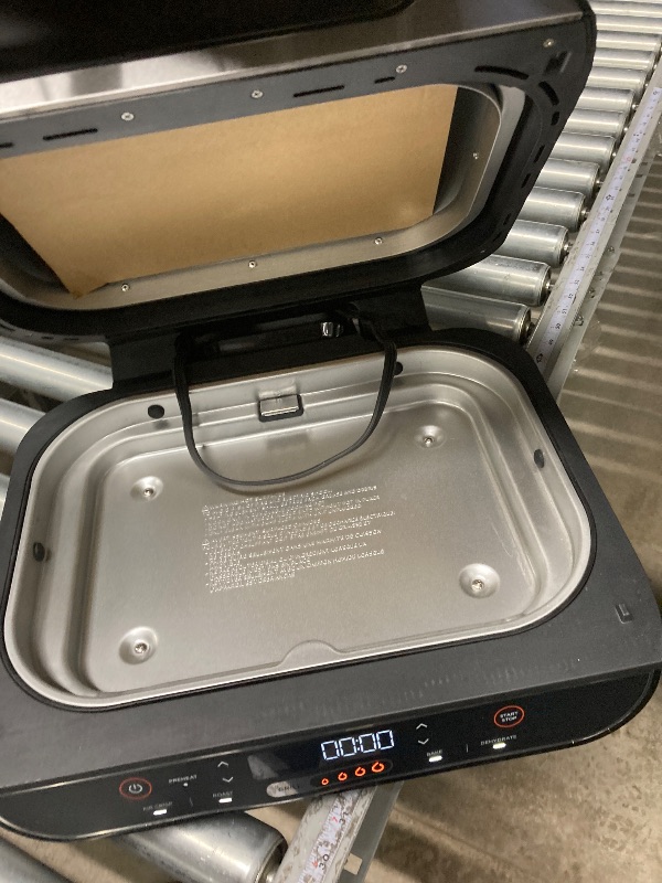 Photo 1 of ****used***Ninja Foodi 4-in-1 Indoor Grill with 4-Qt Air Fryer, Roast, Bake, & Cyclonic Grilling Technology, Black/Stainless