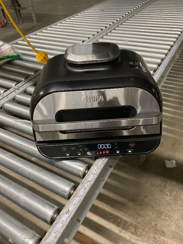 Photo 1 of ****used***Ninja Foodi 4-in-1 Indoor Grill with 4-Qt Air Fryer, Roast, Bake, & Cyclonic Grilling Technology, Black/Stainless