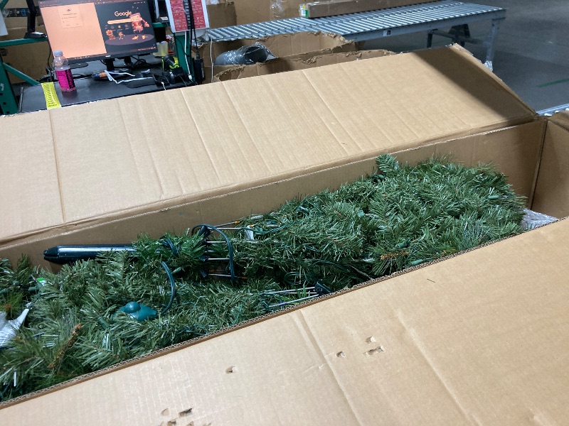 Photo 1 of **SOME LIGHT DONT WORK**National Tree Company Pre-Lit Artificial Full Christmas Tree, Green, Dunhill Fir, White Lights, Includes Stand, 9 Feet