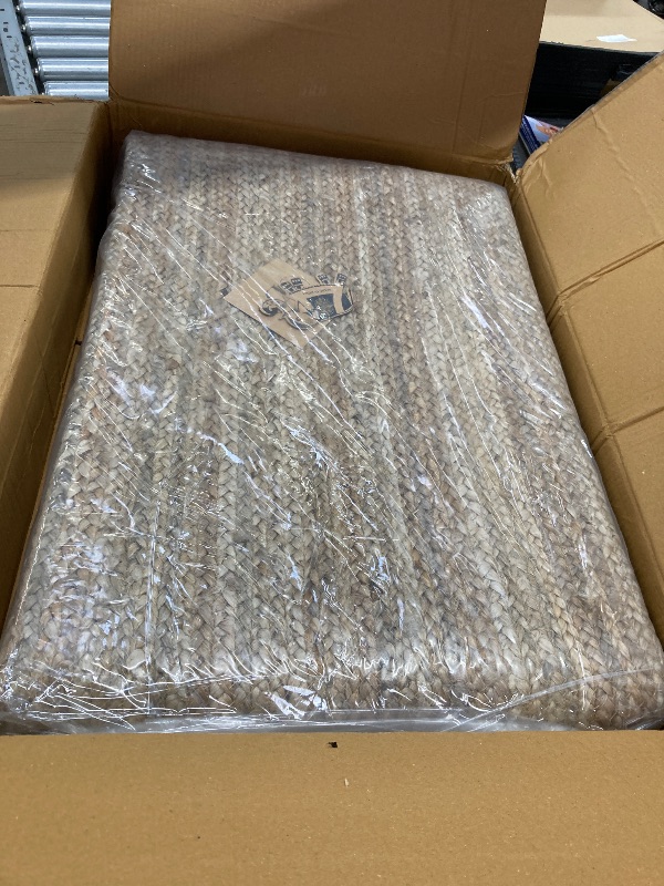 Photo 1 of ***used***FRELISH DECOR Handwoven Jute Area Rug - 6x9 Feet Natural Yarn - Rustic Vintage Beige Braided Reversible Rectangular Rugs for Bedroom - Kitchen - Living Room - Farmhouse (6' x 9')