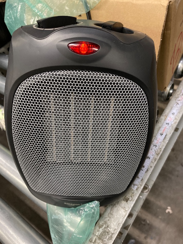 Photo 1 of **used**Amazon Basics Ceramic Space Heater, Portable Indoor Heating Solution, With Overheat and Tip-Over Protection, Thermostat, Non-Oscillating, 1500W, 7.52"D x 6.34"W x 9.45"H, Black