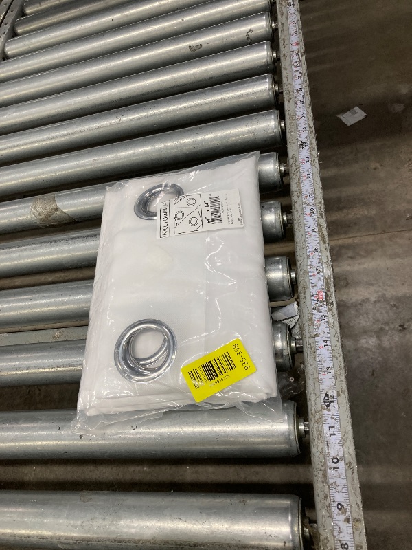 Photo 1 of NICETOWN White Sheer Curtains 84 inches Long - Home Decoration Grommet Airy & Lightweight Elegant Window Treatments with Light Filtering for Bedroom/Living Room (2 Panels, W54 x L84)