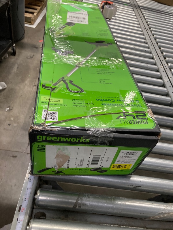 Photo 1 of **IT IS USED, IT IS MISSING PARTS AND IT IS NOT KNOWN IF IT WORKS AT 100%**Greenworks 24V 12-Inch Cordless String Trimmer/Edger and Leaf Blower Combo Kit + 3 Bonus Spools, 2.0Ah Battery and Charger Included