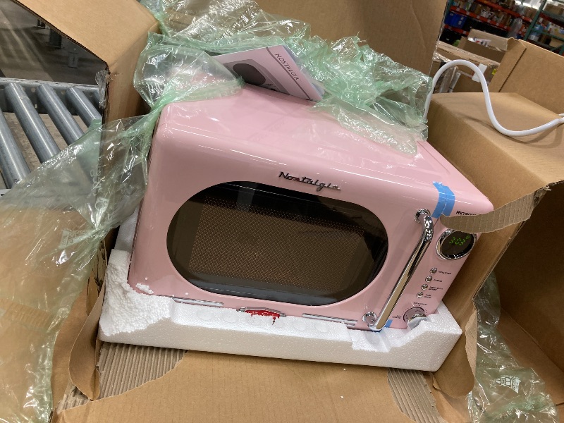 Photo 1 of ***used missing parts***Nostalgia Retro Compact Countertop Microwave OveCu. -Watts with LED Digital Display-Child Lock-Easy Clean Interior-Pink