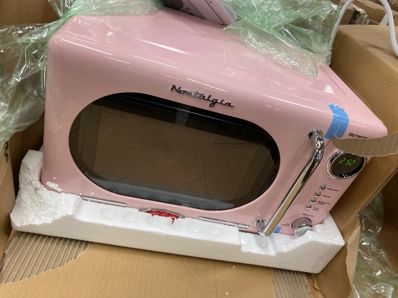 Photo 1 of ***used missing parts***Nostalgia Retro Compact Countertop Microwave OveCu. -Watts with LED Digital Display-Child Lock-Easy Clean Interior-Pink