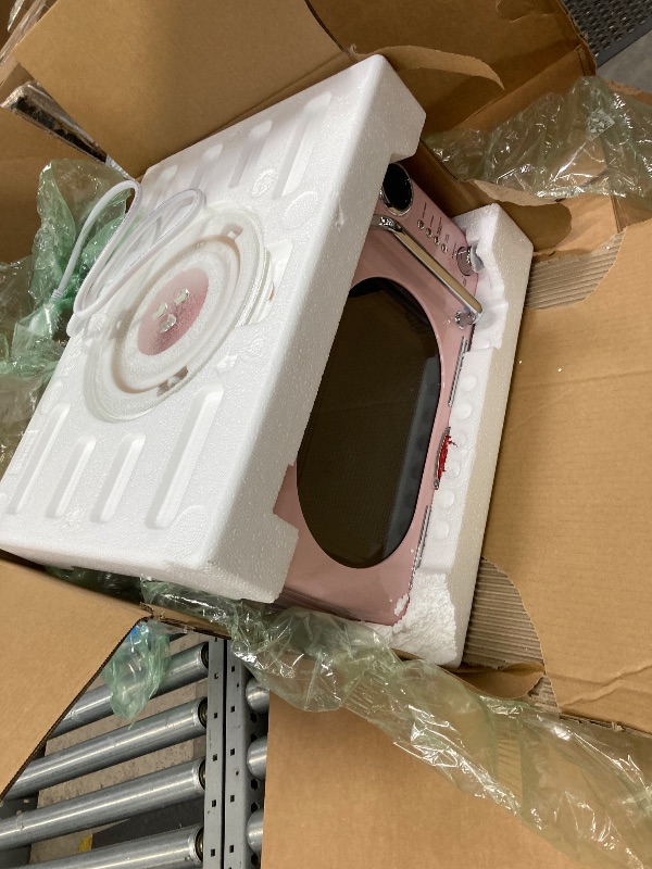 Photo 1 of ***used missing parts***Nostalgia Retro Compact Countertop Microwave OveCu. -Watts with LED Digital Display-Child Lock-Easy Clean Interior-Pink