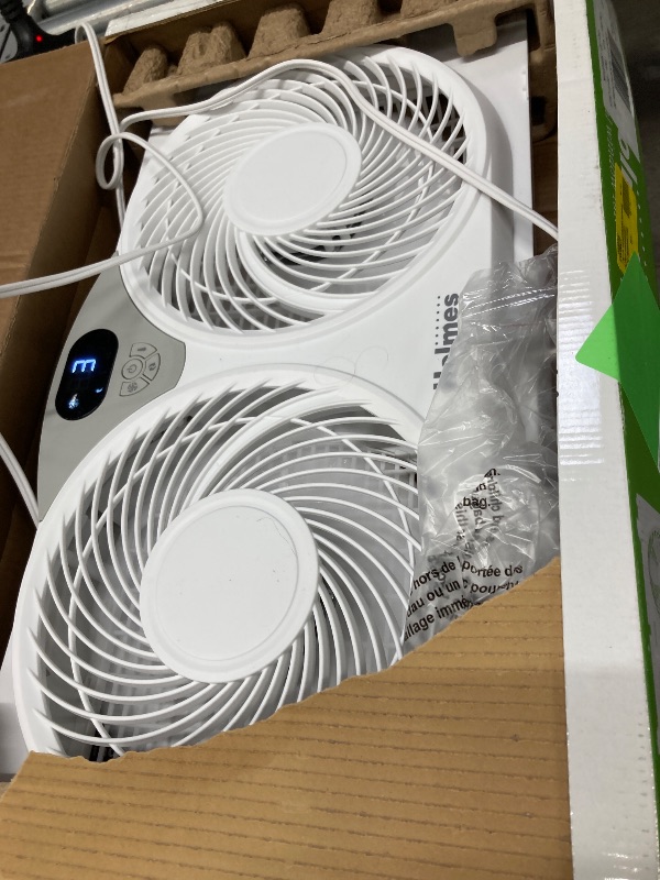 Photo 1 of **used missing parts**Holmes 9" Digital Window Fan, 3-Speed, Thermostat, Remote, Adjustable Extenders