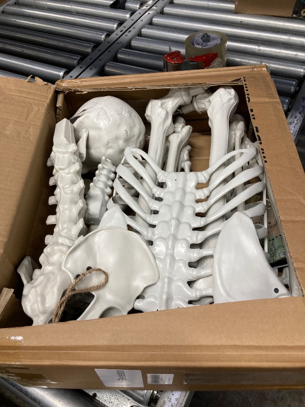 Photo 1 of **It is used, missing a part, and it is not known if it works 100%.***MyoGrip 5 Ft Skeleton Halloween Decorations, Full Body Life-Size Skeleton Prop with Movable Joints for Halloween Decorations Outdoor Yard Haunted House Prop Decorations