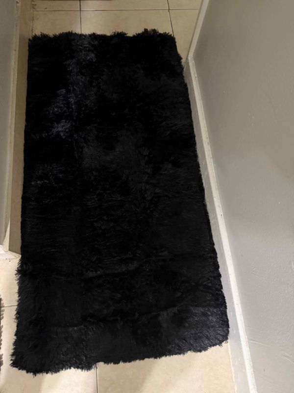 Photo 1 of ***used** originally bought this black fluffy rug for my bedroom, but I ended up putting it in my bathroom—and wow, it completely transformed the space! It’s incredibly soft underfoot, feels super cozy when stepping out of the shower, and adds a mode