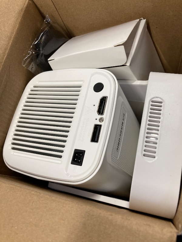 Photo 1 of ?Auto Focus&1080P?Magcubic Mini Smart Projector with 4K Support, Portable Projector with Wifi and Bluetooth, 5W Speaker, Built in Apps, Voice Control, Outdoor Movie Projector