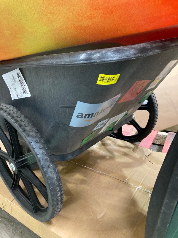 Photo 1 of ***CRACKED HANDLE***Rubbermaid Commercial Products 8.75 Cubic Foot, All-Weather, Big-Wheel Cart/Yard Cart/Lawn Cart/Wheelbarrow, Yardwork/Landscaping/DIY Projects, Durable/Weather Resistant, Black***CRACKED HANDLE***