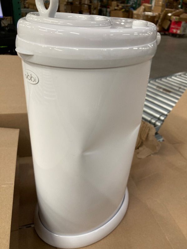 Photo 1 of **LARGE DENT ON SIDE/NOT IN ORIGINAL BOX***Ubbi Steel Diaper Pail, Odor Locking, No Special Bag Required, Award-Winning, Registry Must-Have, White