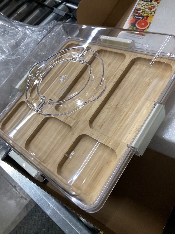 Photo 1 of ***MISSING CARRYING HANDLES -SELLING AS IS *** Charcuterie Board with Clear Locking Lid and Handle, 6 Compartment Bamboo Cheese Board Snackle Box, Portable Cutting Board for Snacks, Fruits&Meats, Ideal Gift for Parties, Birthday& House Warming