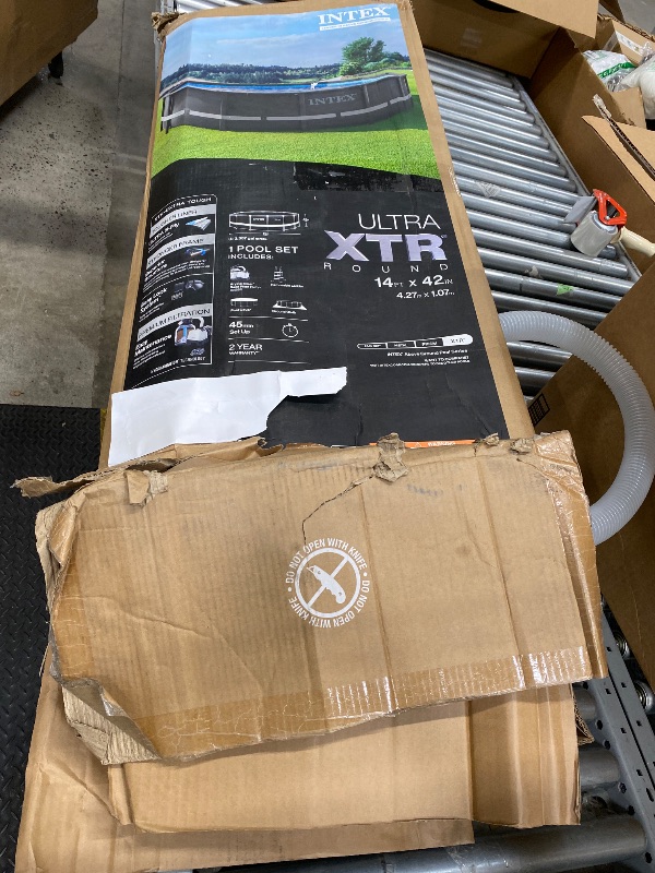 Photo 1 of ***MISSING PIECES -SELLING AS REPLACEMENT PARTS ONLY*** Intex Ultra XTR Frame 14' x 42" Round Above Ground Outdoor Swimming Pool Set with Sand Filter Pump, Ladder, Ground Cloth, and Pool Cover