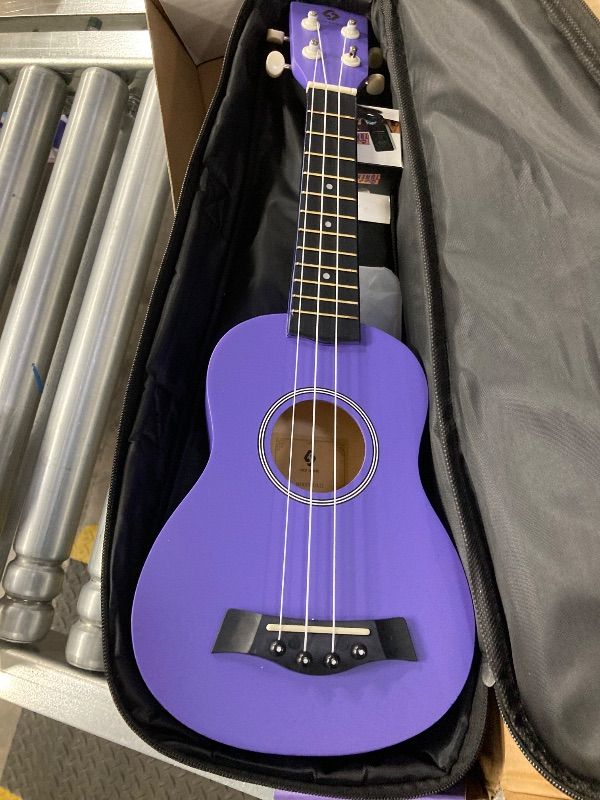Photo 1 of ***MISSING ONE STRING*** Soprano Ukulele Beginner Pack, 21 Inch Basswood kids Ukuleles Starter Kit with Gig Bag Spare Strings Tuner and Picks. (purple)