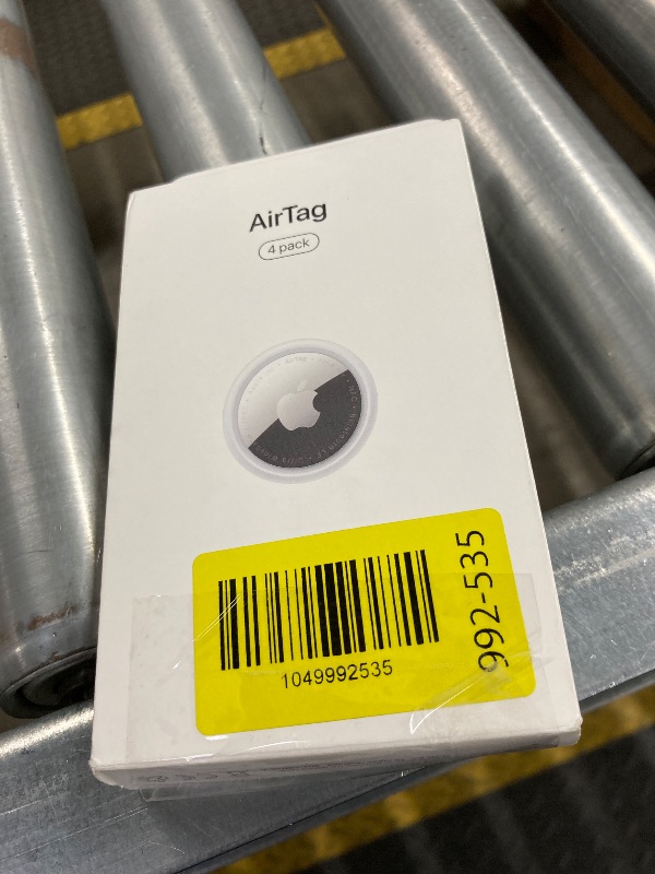 Photo 1 of **please see the picture, different item**Apple AirTag (1st Generation) - 4 Pack. Keep Track of and find Your Keys, Wallet, Luggage, Backpack, and More. Simple one-tap Set up with iPhone or iPad, Bluetooth