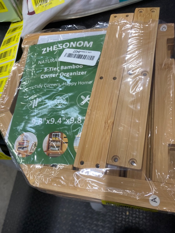 Photo 1 of ***missing screws and two slats***ZHESONOM Plate Organizer for Cabinet and Kitchen Countertop, 3-Tier Bamboo Corner Shelf - Space Saver, 3 Tier Shelf for Dishes, Bowls, Bread Storage in Pantry & Bathroom (9.5”, Natural)***missing screws and two slats***