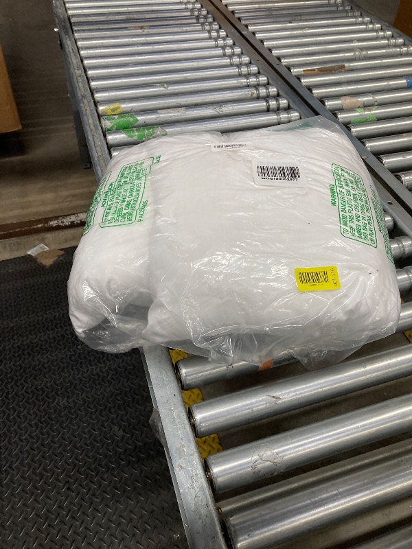 Photo 1 of (NUZZLE* BRAND) 2 REGULAR SIZE SOFT WHITE PILLOWS