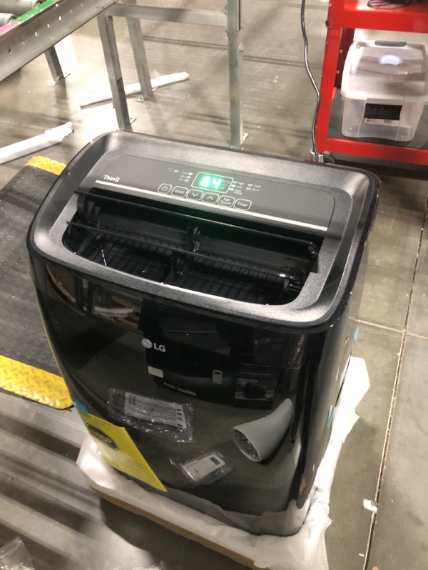 Photo 1 of ** NEW/ TESTED FUNCIONAL / MANUAL AND ACCESORIES INCLUDED** LG 10,000 BTU Smart Portable Air Conditioner, 115V, Cools 450 Sq.Ft. (18' x 25' Room Size), Portable Air Conditioner for Home with Voice Control, Works with LG ThinQ, Amazon Alexa, and Hey Google