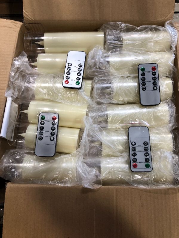 Photo 1 of ** RETAIL PRICE 42.99*****I24 IN THE BOX AND 4 CONTROL REMOTE****24 Pack LED Flameless Candles Set(14/16/18cm), Battery - Operated with 4 Remotes,Clear, Timer & Flickering/Steady Modes for Home décor, Wedding, Patio,Outdoor.
