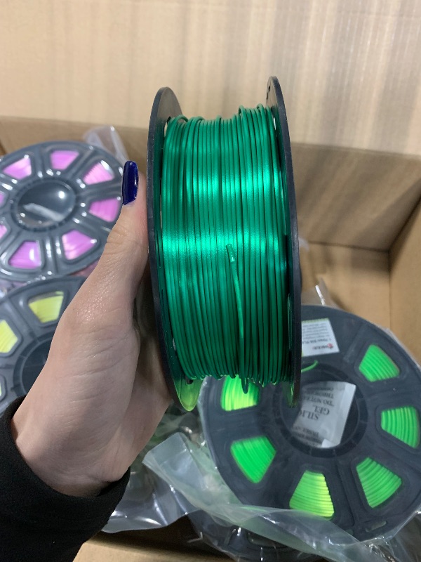 Photo 1 of ****DARK GREEN COLOR WAS SLIGHTLY USED*** ***NO MISSING PARTS**** MIKA3D 12 in 1 Bright Shine 3D Printer Silk PLA Filament Bundle, Most Popular Colors Pack, 1.75mm 500g per Spool, 12 Spools Pack, Total 6kgs Material with One Bottle of 3D Printer Stick